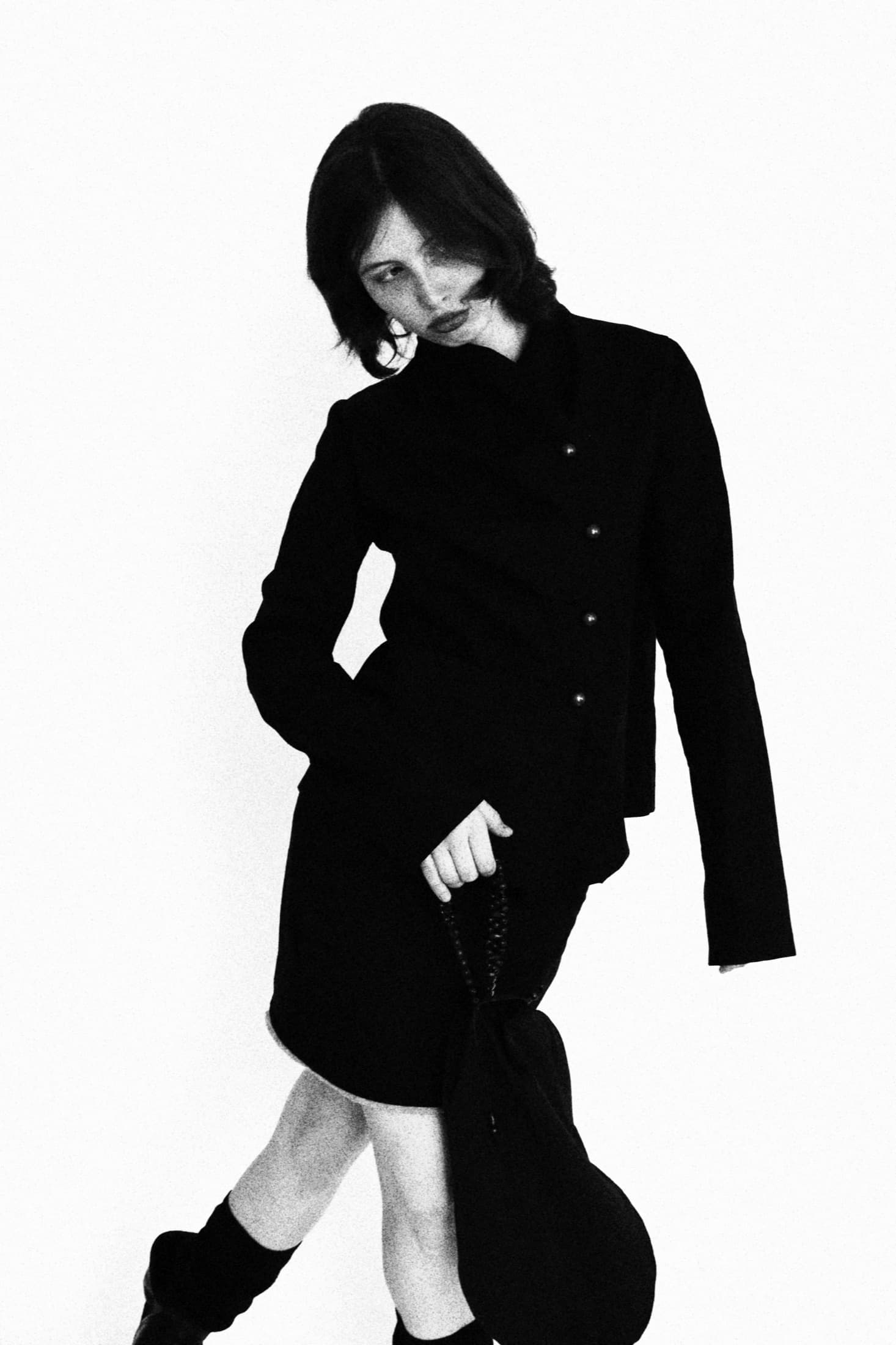 draped jacket with a stand-collar and button fastening